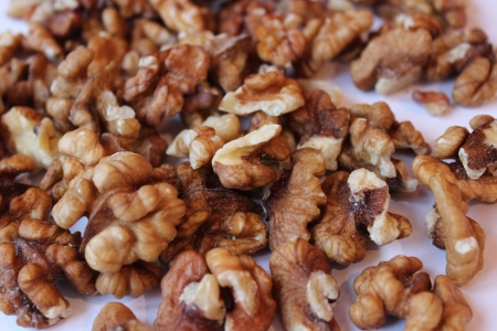 the image of heap of ripe seeds of walnutsの写真素材