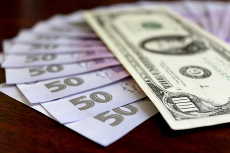Some grivna banknotes with value of 50 and hundred of dollars