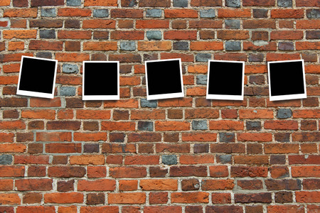 empty cards on the wall from the red brick