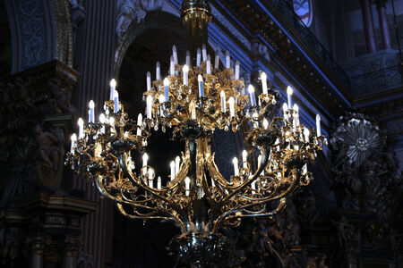 Beautiful chandelier with many candles under the church topのeditorial素材