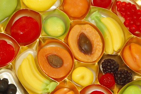 fruit candy in shape of fruits apricot blackberry and othersの写真素材