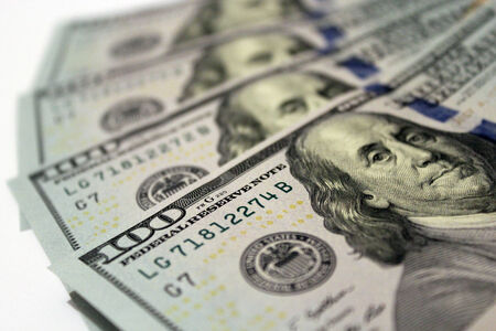 new hundred dollar bank notes isolated on the white background