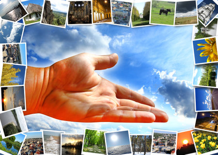 offering hand and many different images on the background of blue skyの写真素材
