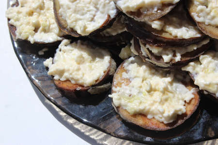 dish from fried pieces of eggplants in sauceの写真素材