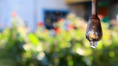 drop of water dripping from the washbasin in the village