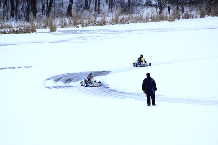 competitions of kart racing on the ice of Strizhen river in Chernihivのeditorial素材