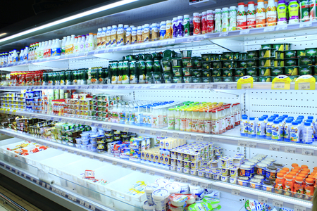 dairy produce on the shelves of shopのeditorial素材