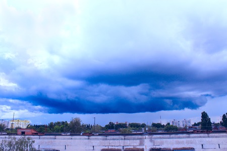 storm-cloud above the city. landscape with big and awful thundercloudの写真素材