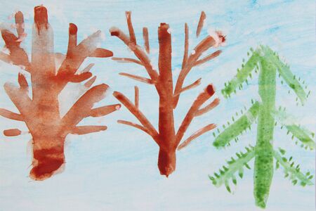 Children's drawing with brown trees and New Year tree on blueish background. Childish drawing. Childish drawing with tree. Autumn by eyes of children. Childish artの写真素材