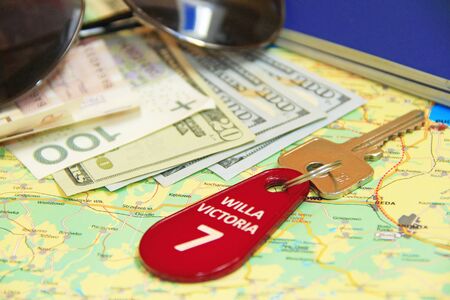 money and villa keys. Travel concept. Things collected for travel. Everything you need for vacation....