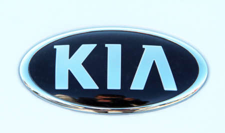 Sign of modern car is presented at exhibition in Kiyv. SUV auto. KIA brand sign. Modern off road cars. SUV auto