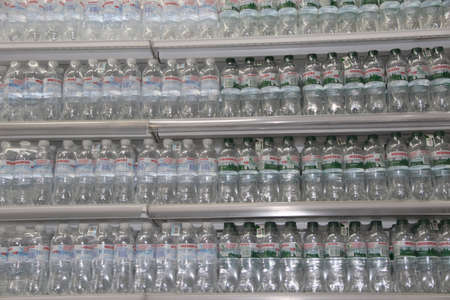 Bottles of Morshinska mineral water on the shelves of supermarket. Drinking Water on the shelf. Mineral water of Ukrainian manufacturer. Morshinska famous brand of mineral drinksのeditorial素材