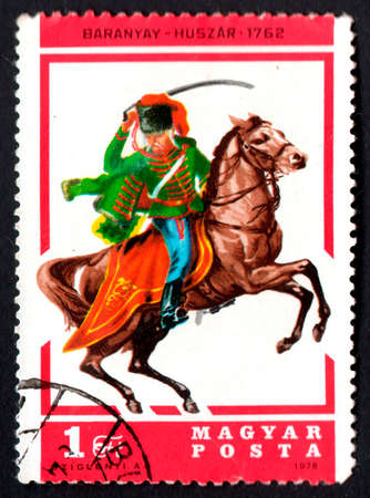Hungary - CIRCA 1978: Hungarian postage stamp with rider on horseback. Hungarian Post. Hungarian postage stamp 1978. Magyar postaのeditorial素材