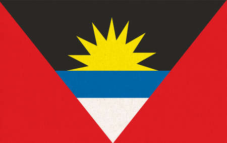 Flag of Antigua and Barbuda on fabric surface. Antigua and Barbuda national flag on textured background. Antigua and Barbuda state flag - 3D illustration. Fabric textureの写真素材