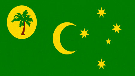 Flag of the Cocos Islands. Australian Outer Territory. National flag of Cocos islands. Territory of Cocos. flag of Keeling Islands on fabric surface. island country. fabric texture. 3D Illustrationの写真素材