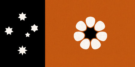 Flag of Australian state of Northern Territory. Official flag of Northern Territory. Symbol of Australian state. State symbol. Flag of Northern Territory on fabric texture,の写真素材