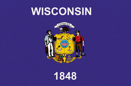 Flag of American state Wisconsin on fabric surface. Wisconsin state flag on textured background. Colored Wisconsin flag on fabric surface. Official American state symbolの写真素材