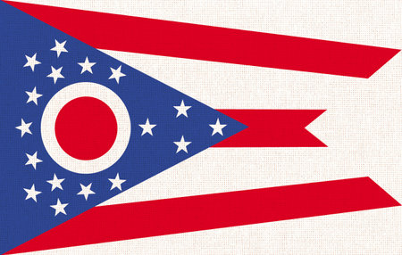 Flag of American state Ohio on fabric surface. Ohio state flag on textured background. Colored Ohio flag on fabric surface. Official American state symbolの写真素材