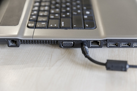 Old laptop on the tableの写真素材