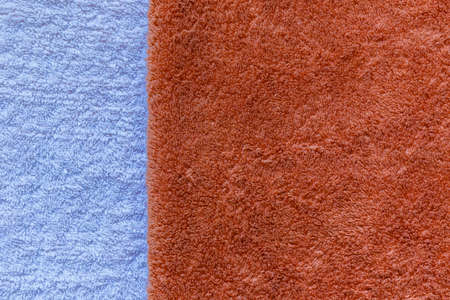 Neatly folded towels on the tableの写真素材