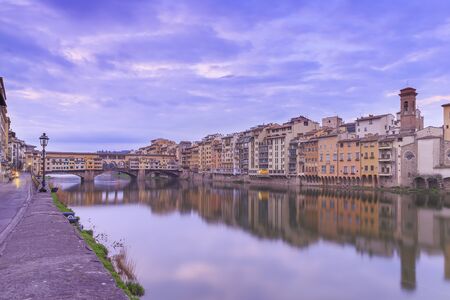 Bridge Ponte Vecchio in Florence at sunrise.Italyの写真素材