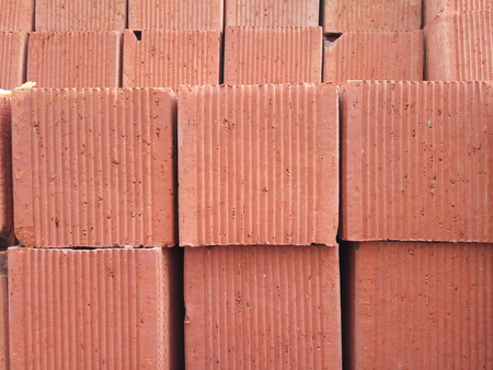Texture of bricks stacked in a stackの写真素材