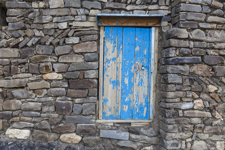A door to the utility room in a house in the village of Khinaligの写真素材