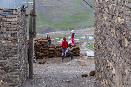 KHINALIG,QUBA,AZERBAIJAN-10 May 2018:Local children play and pose for the photographerのeditorial素材