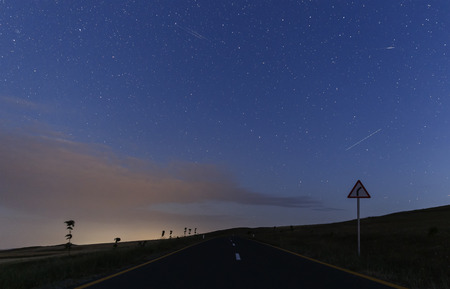 New asphalt road and starry sky