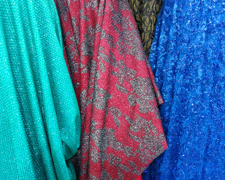 Rolls of fabric sold in the store