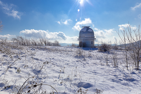 Small dome of the telescope at the Shemakha Observatory in winterの写真素材