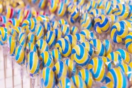 Swirling lollipops sold in a storeの写真素材