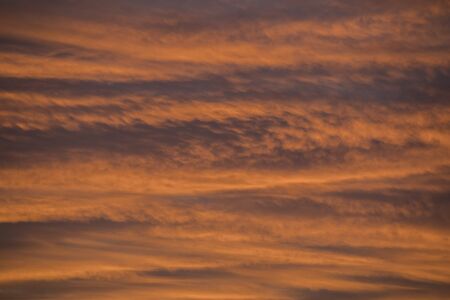 Texture of orange clouds at sunrise