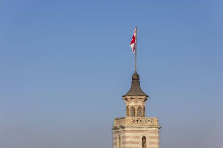 Georgian flag on the Town Hall of Liberty Squareの写真素材