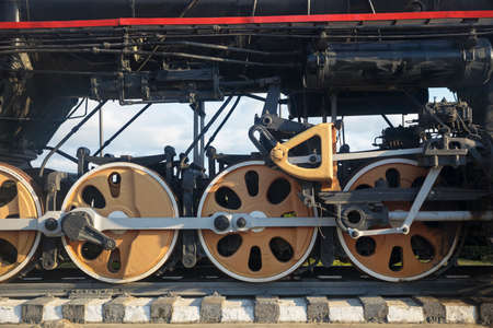 Wheels of an old Soviet steam locomotiveの写真素材