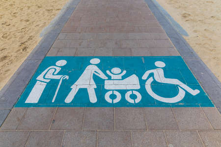 Brick path with warning sign