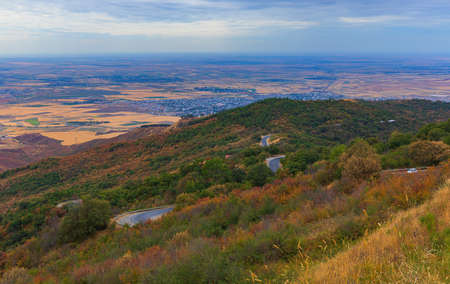 Mountain serpentine pass through the forestの写真素材