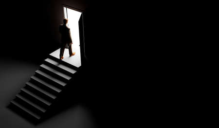Silhouette of a man standing in front of an open door. 3d renderの写真素材