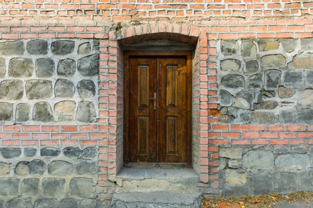 Opening of an old wooden wallの写真素材