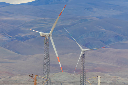 Wind turbines against a gloomy skyの写真素材