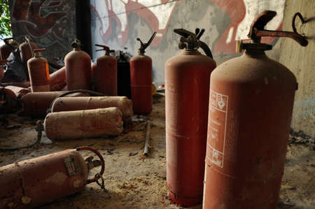 Abandoned fire extinguishersの写真素材