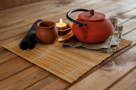 Iron teapot with green tea to serveの写真素材