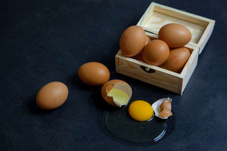 Box with egg and broken egg