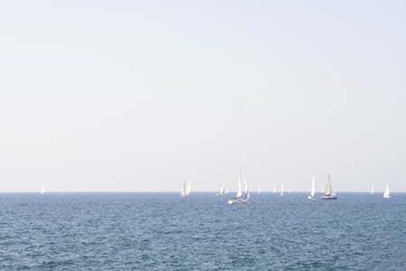 yachts on the waves of a sea landscape の写真素材