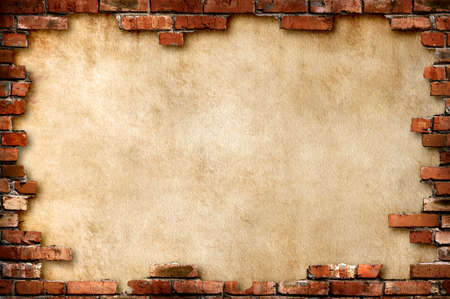 Grungy parchment paper background surrounded by red brick frame isolated with clipping pathの写真素材