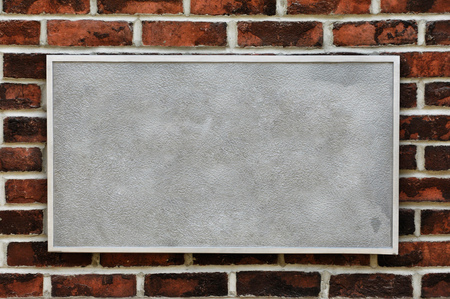 Metal sign on brick wall backgroundの写真素材