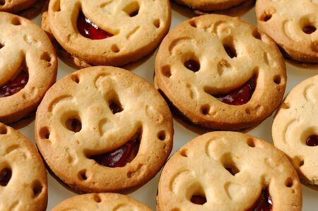 Smiling cookies filled with jamの写真素材