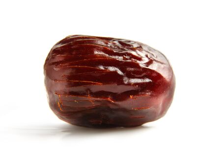 Dried date close-up Isolated on white backgroundの写真素材