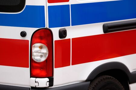 Ambulance vehicle red and blue stripes close-up