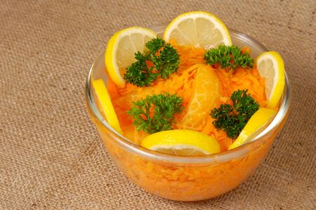 Appetizing moroccan grated carrot salad with orange still lifeの写真素材